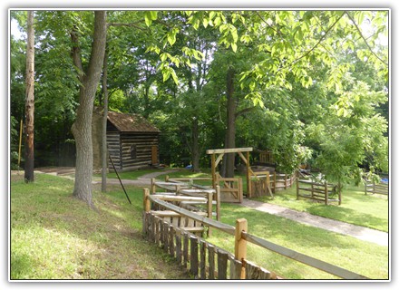 A meadow near the entrance showcases the historic Walker-Ewing-Glass Log House and sheep meadow. PHOTO BY PAT JENNETTE